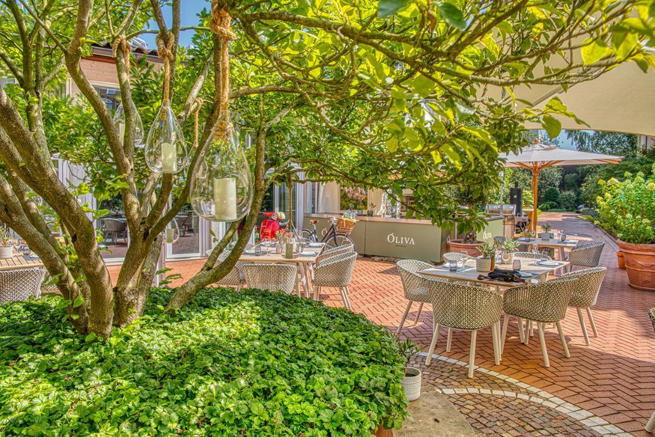 Vila Vita Rosenpark Marburg Екстер'єр фото The garden of the restaurant